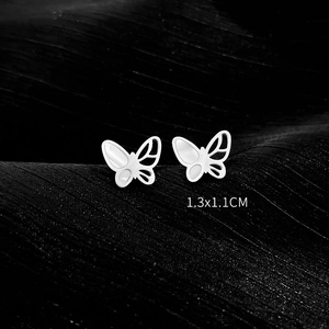 Detailed close-up of butterfly stud earrings in silver steel, size 1.3x1.1 cm