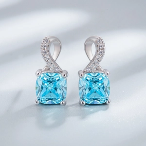 Elegant S925 silver jewelry set featuring emerald cut blue gemstone earrings with diamonds