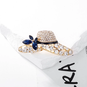 Vintage gold alloy hat brooch with blue crystal flowers and sparkling rhinestones
