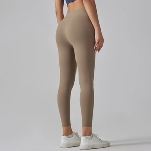 Rear view of high-waisted brown yoga pants with butt-lifting fit and matte fabric