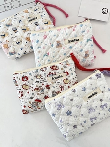 Quilted floral pouch collection with cute bear and dog prints and zipper strap