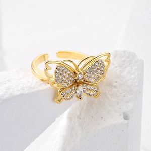 Exquisite gold-plated butterfly open ring with sparkling white zircon on white rock