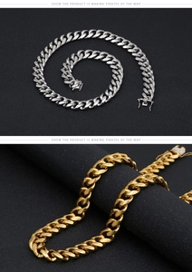 Detailed view of silver and gold Cuban link chains with secure lobster clasps on black surface