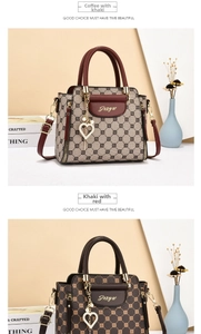 Detail view of luxury monogram handbags with heart charms and adjustable straps