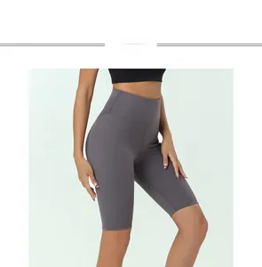 Detail of high-waist seamless wide waistband on dark grey stretch yoga shorts