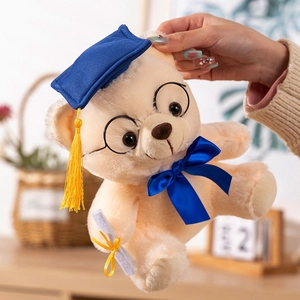 Plush graduation bear with blue mortarboard cap and round glasses for graduation gifts
