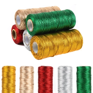 1.5mm metallic hollow string spools in gold, silver, and red for gift wrapping