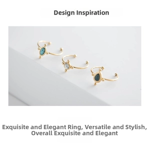 Detail of 18K gold stainless steel open rings featuring green turquoise and marble stones