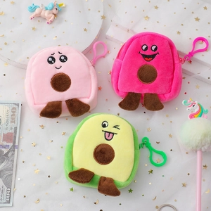 Detailed view of plush avocado coin purses in pink and green with plastic clips