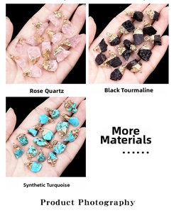 Detail of rose quartz and black tourmaline pendants with gold plated caps for DIY necklaces