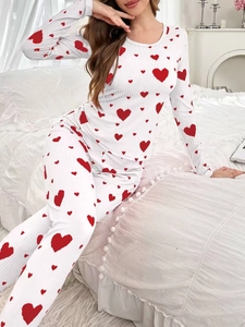 Detail view of heart print pajama set with soft ribbed texture and long sleeves