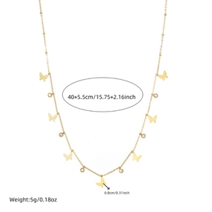 Detail of gold necklace showing butterfly pendants and gemstone sizing measurements