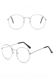 Detail view showing front and 45-degree angle of silver metal round glasses frames