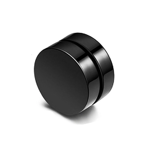 Macro view of polished black magnetic clip-on earring with a minimalist disc design
