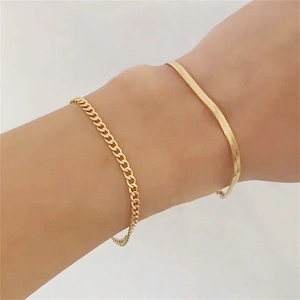Close-up of dual-layer gold-plated stainless steel snake and link chain bracelet set