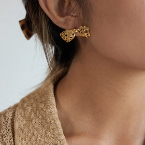 Boucles d'oreilles nœud en acier inoxydable doré 18k avec texture de lave