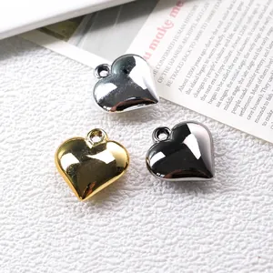 Polished acrylic heart pendants in gold, silver, and black for DIY jewelry making