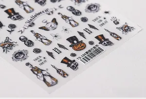 Detailed sketch-style Halloween nail stickers featuring skulls and pumpkins, model TS-186