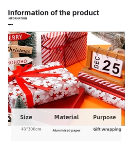 Detail view of red striped and star patterns on 43x300cm Christmas gift wrapping paper