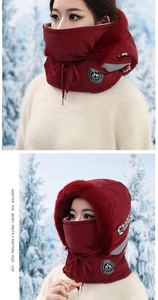 Detail of wine red winter thermal hood with plush fur trim and adjustable neck drawstring