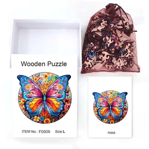Detailed view of colorful butterfly wooden puzzle with white box and reference card