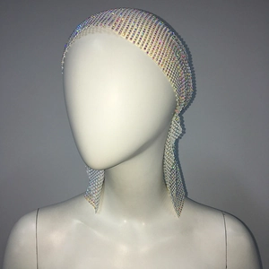 Detailed close-up of sparkling rhinestone mesh headscarf for party and clubwear