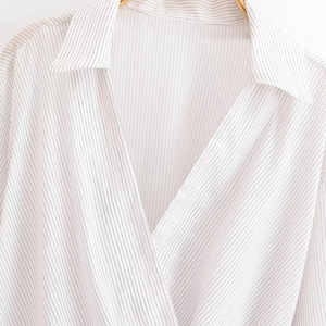 French style white vertical striped shirt with lapel and waist tie for a slim fit look