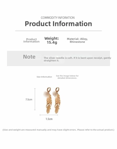 Detail of gold feather earrings with rhinestones, 7.5cm long, silver needle, 15.4g weight