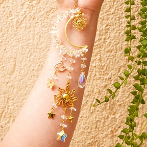 Golden moon and sun suncatcher with natural crystal beads and hanging prisms