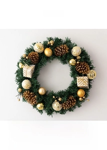 Close-up of Christmas wreath with golden ornaments, pine cones, and mini gift boxes