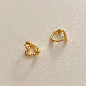 Minimalist 925 sterling silver gold heart beaded hoop earrings in a 45-degree angle view