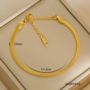 Detail showing 3mm gold snake chain bracelet with lobster clasp and extender chain