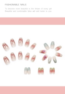 Detail of short ballet press-on nails with lemon pattern and sparkling diamond accents