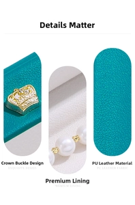 Detailed macro view of premium cyan PU leather jewelry box with golden crown clasp