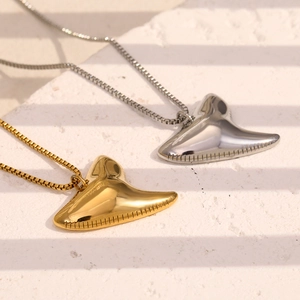 Polished stainless steel stingray pendant necklaces in gold and silver finish