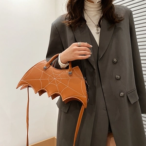 Gothic brown PU leather bat-shaped crossbody bag with white spider web embroidery detail