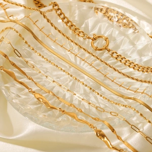 Elegant gold-plated stainless steel necklace set with snake and rope chain designs