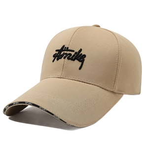 Khaki baseball cap with long brim and sport embroidery details in a white background view