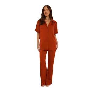 Women's satin short sleeve pajamas set with button-down shirt and long pants in rust orange