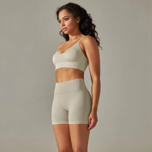 Detail of seamless ribbed sports set showing fabric texture on sports bra and shorts