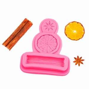Pink silicone mold for spice-shaped crafts featuring star anise and cinnamon sticks