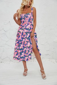 Floral print sun dress detail with side slit and front tie on blue summer fabric