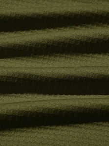 Detailed macro view of olive green waffle knit texture and premium fabric ripples