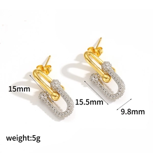 Detailed view of gold U-link earrings with white zircon pavé and measurements