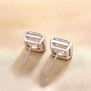 Classic emerald-cut sugar cube stud earrings with secure four-prong setting in silver