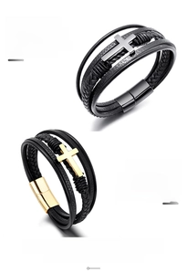 Close-up of multi-layer leather bracelets with stainless steel cross and magnetic clasp