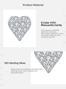 Vue macro de boucles d'oreilles cœur en argent 925 avec moissanite D couleur VVS1