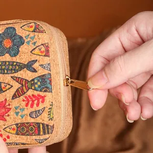 Portable vintage cork jewelry box with colorful fish patterns and gold zipper detail