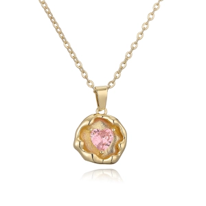 Detailed close-up of pink heart zircon pendant on a gold-plated lava texture necklace