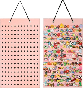 Pink felt wall-mounted organizer for shoe charms with dual display showing capacity